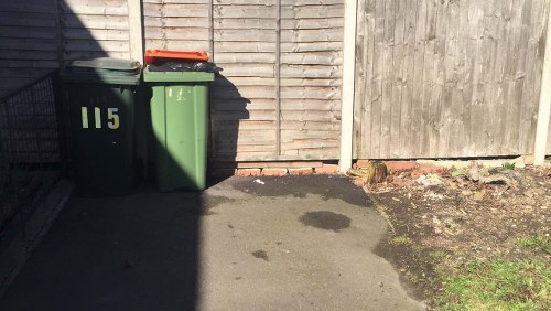 Decluttered garage in Chelmsford showcasing organized storage